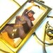 Batgirl recycled comic book pendant
