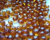 Vintage Glass Beads, bicones, amber, 20 beads