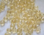 Vintage Glass Beads, bicones, yellow, 12 beads