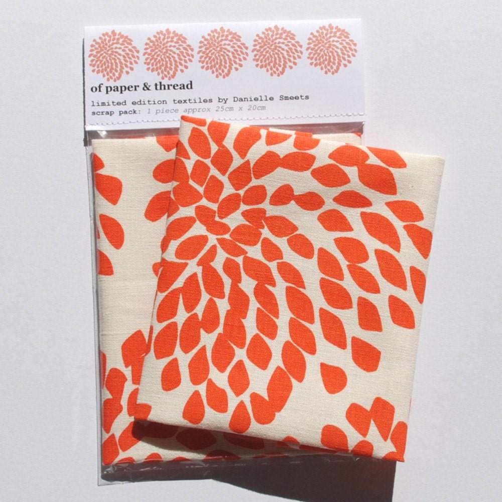 Scrap of Protea fabric (orange on cream) 