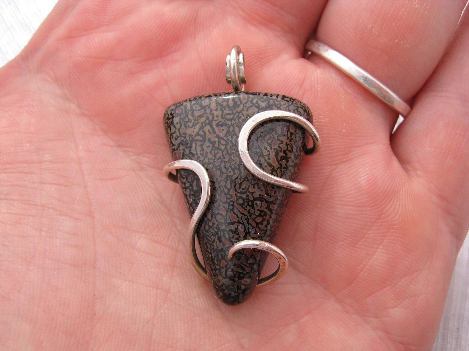 Stone Fossil Dinosaur Bone Cabochon set in Sterling Silver Cold Forge Wrap