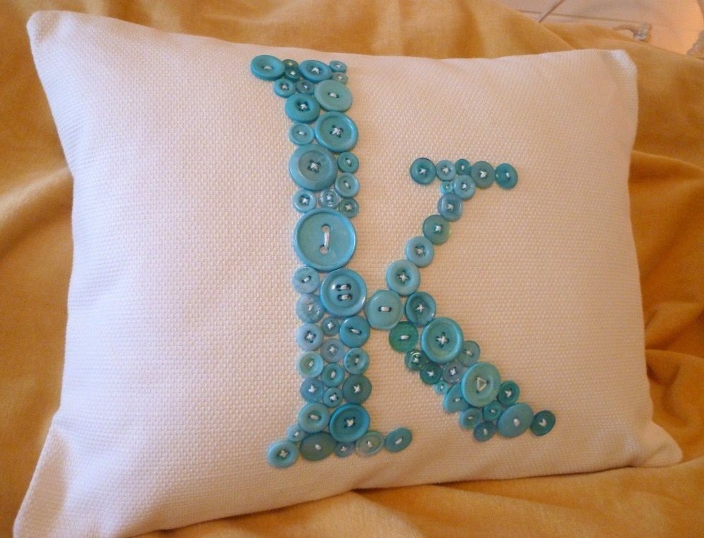 White Letter 'K' Pillow Monogrammed in Ocean Blue Buttons -- by Letter Perfect Designs on Etsy -- Any Letter Available