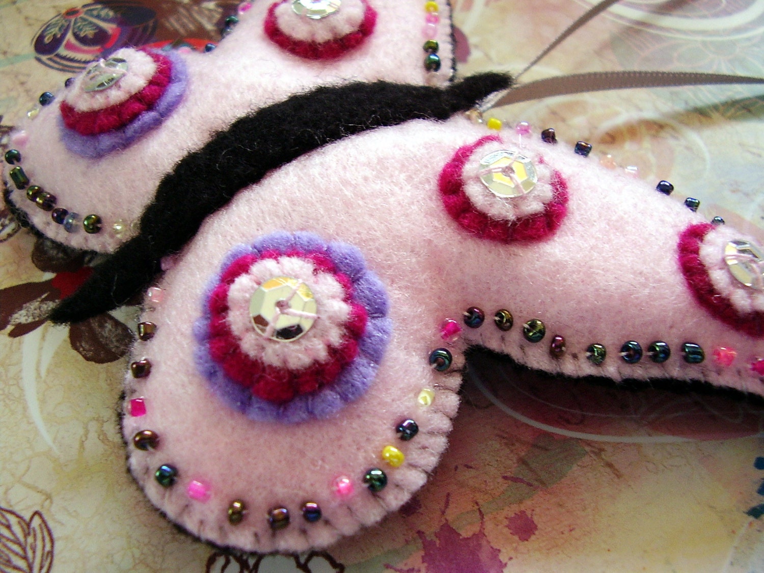 Pink felt and sequin hanging butterfly decoration