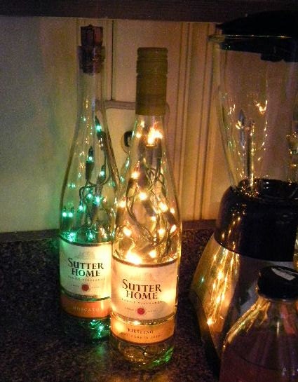 2 Lighted Wine Bottles Sutters Home Moscato and Reisling