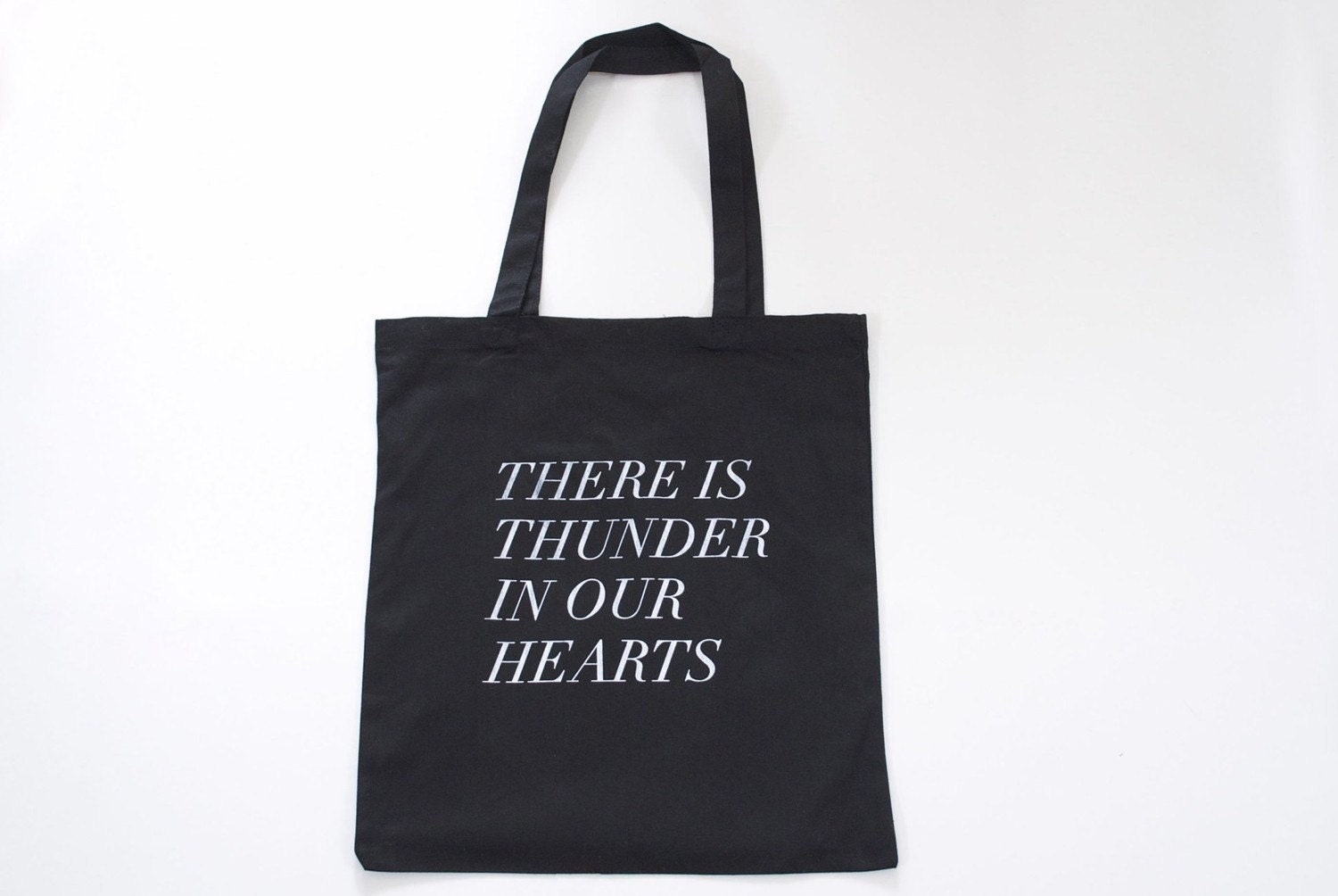 thunder in our hearts tote in black