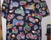 Scrub top size motorcycle print New never worn 60 inchesaround chest