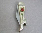 Scrimshaw Leg Pocket Knife with Red Rose