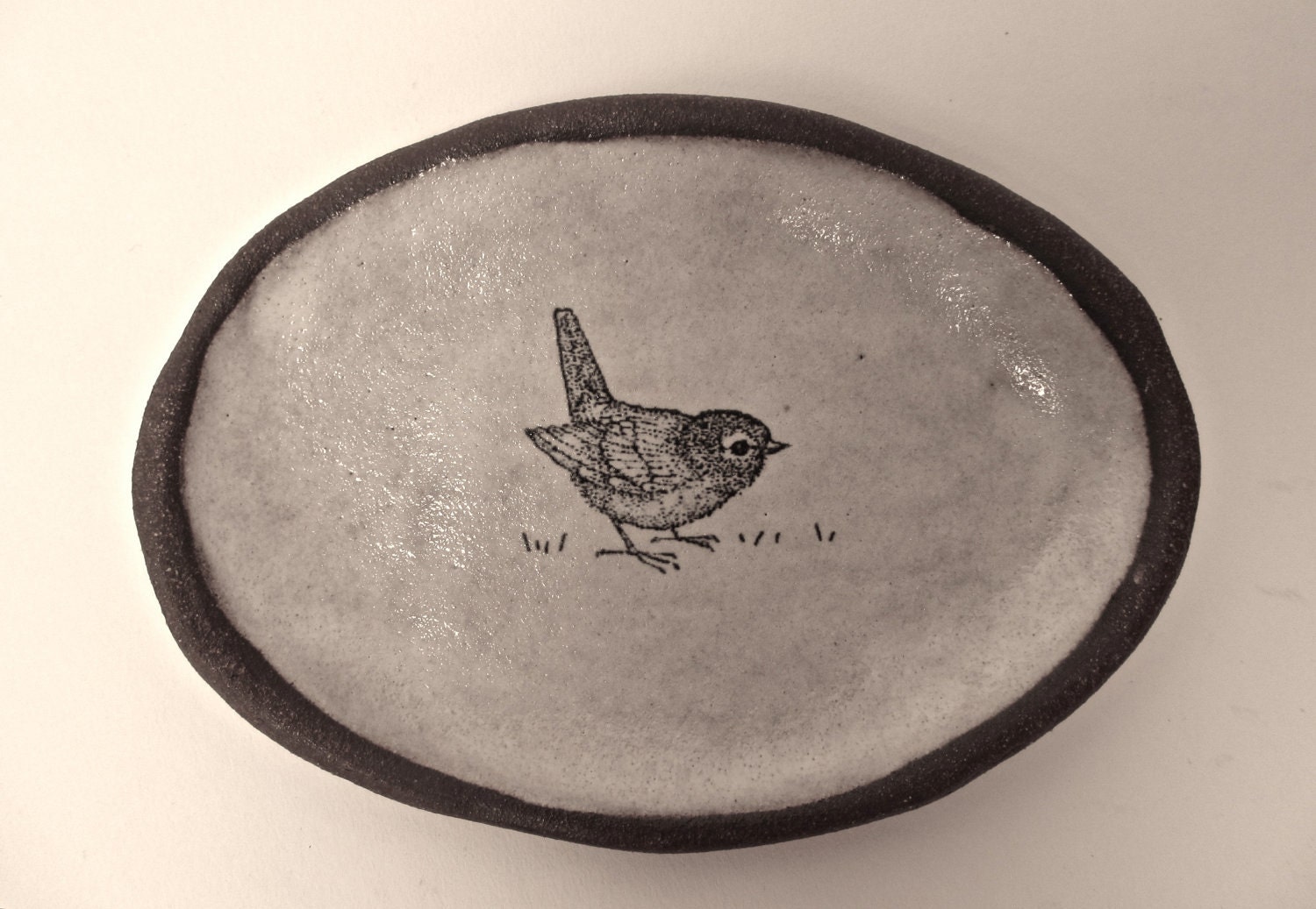 oval bird dish.