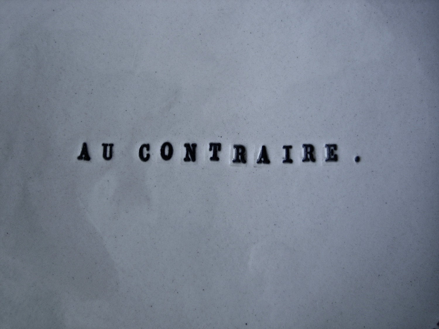 FRENCH red stitch plate (AU CONTRAIRE).