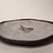 oval bird dish.