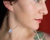 Large hoop earrings with irridescent drops