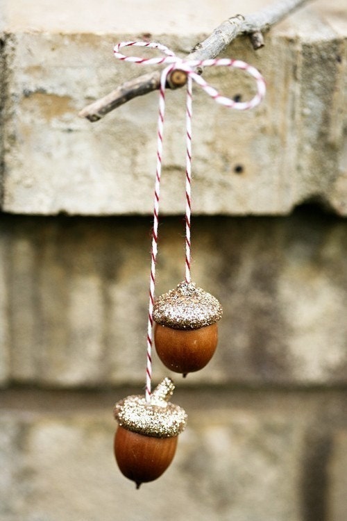 3 sets of golden acorns . ornaments