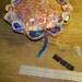 large 8"pincushion with 12 spools of thread
