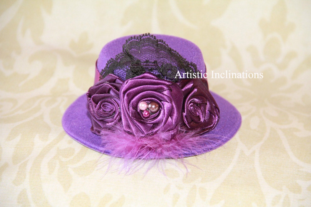 Elegant Touch - Stunning Purple Mini Top Hat with Handmade Purple Rosettes Lace Feathers and Pearls, Hat for Women, Hat for Baby Girl