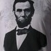 L Abraham Lincoln Silverprint T-shirt ..... Men's Large tee