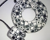 Round black and white Klimt style toggle necklace