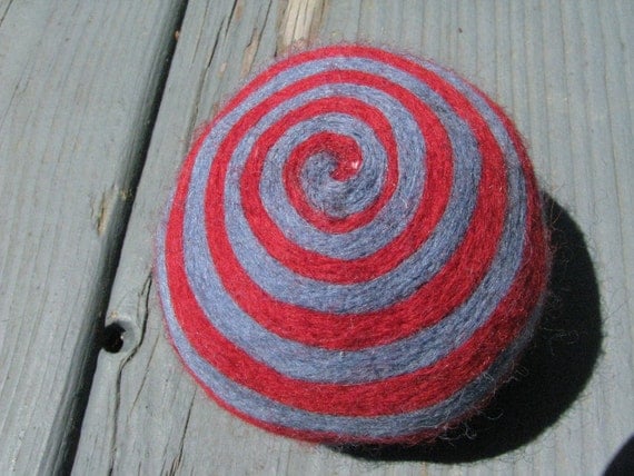 One multi-colored felted pin-cushion, Red and Blue