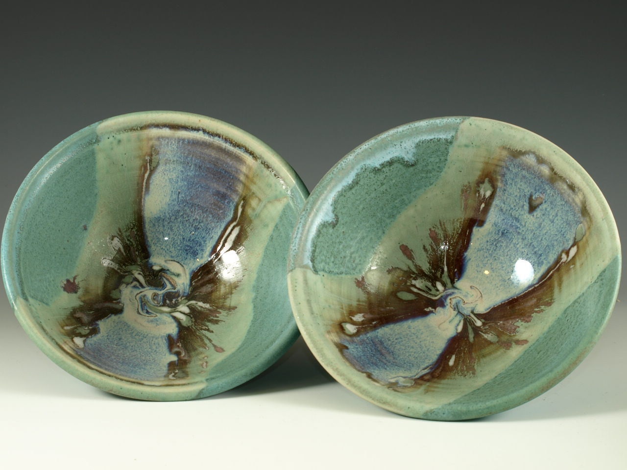 A pair of Eating Bowl in turquoise blue handmade stoneware cereal bowl