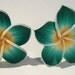 large sweet green yellow and white polymer clay plumeria hibiscus flower clip on earrings