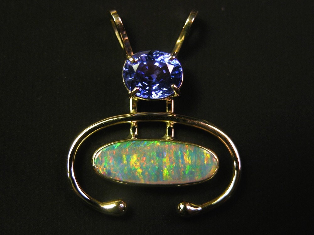 Blue Sapphire and Lightening Ridge Australian Crystal Opal Pendant in 18 karat Gold YOU GO GRRRL