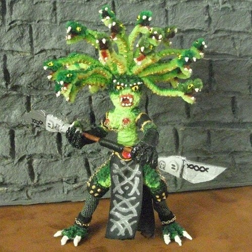 Medusa Figure with Twin-Bladed Staff (NSFW)