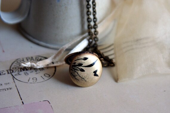 butterfly. locket necklace. brass ox