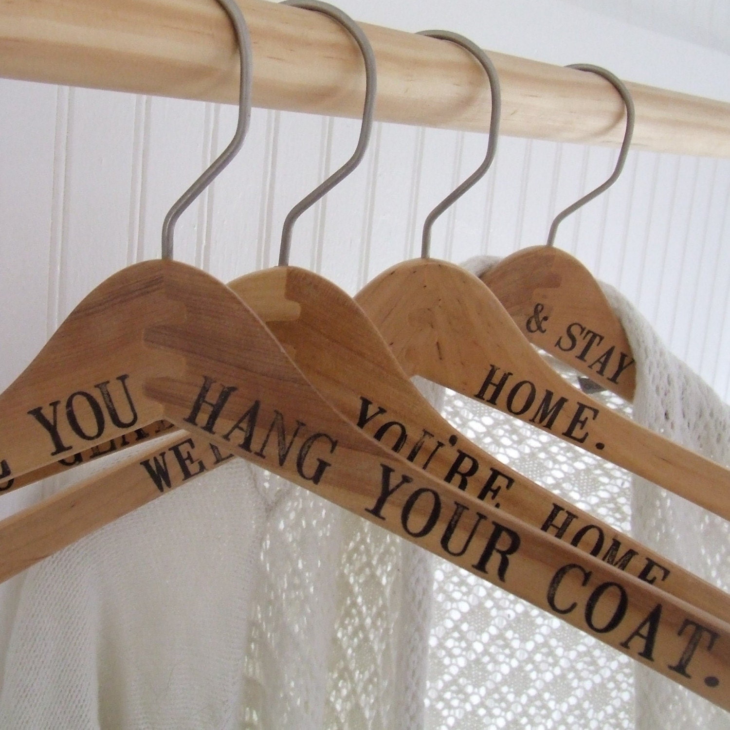hang up your coat - set of 4 reclaimed wooden hangers hand stamped with text