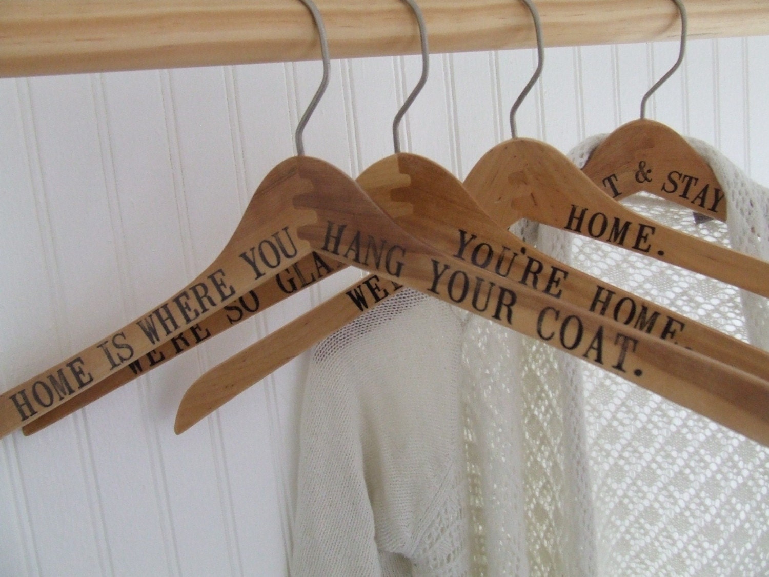 hang up your coat - set of 4 reclaimed wooden hangers hand stamped with text