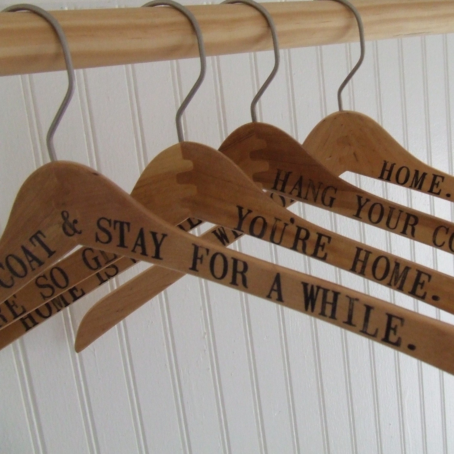 hang up your coat - set of 4 reclaimed wooden hangers hand stamped with text