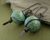 Oxidised copper earrings with chalk turquoise beads spiral wrapped on a hammered paddle headpin