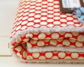 baby blanket, polkadot white on red, classic, stylish, parent-friendly.