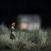 Diorama photo, miniature figure redhead girl outside house at night, Half Awake series, Outskirts - 8x10 photograph