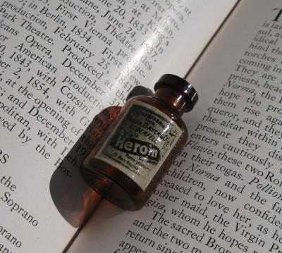 Heroin miniature glass patent medicine bottle pendant charm