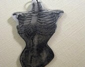 Vintage skeleton torso in a corset illustration charm