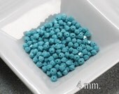 100 pcs. Turquoise Swarovski Crystal Bicone 4 mm.