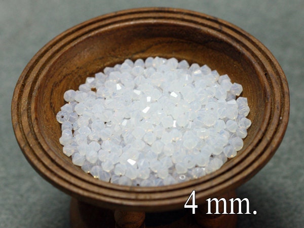 100 pcs. White Opal Swarovski Crystal Bicone 4mm.