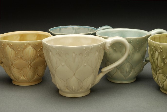 Stamped cup, ivory