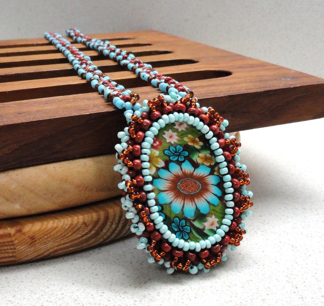 Jewelry necklace beaded pendant with millefiori turquoise brown beaded polymer clay cabochon by Artefyk tagt team
