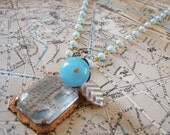 Miss Havisham . Lace under Glass, Vintage Chain, and Blue Amazonite