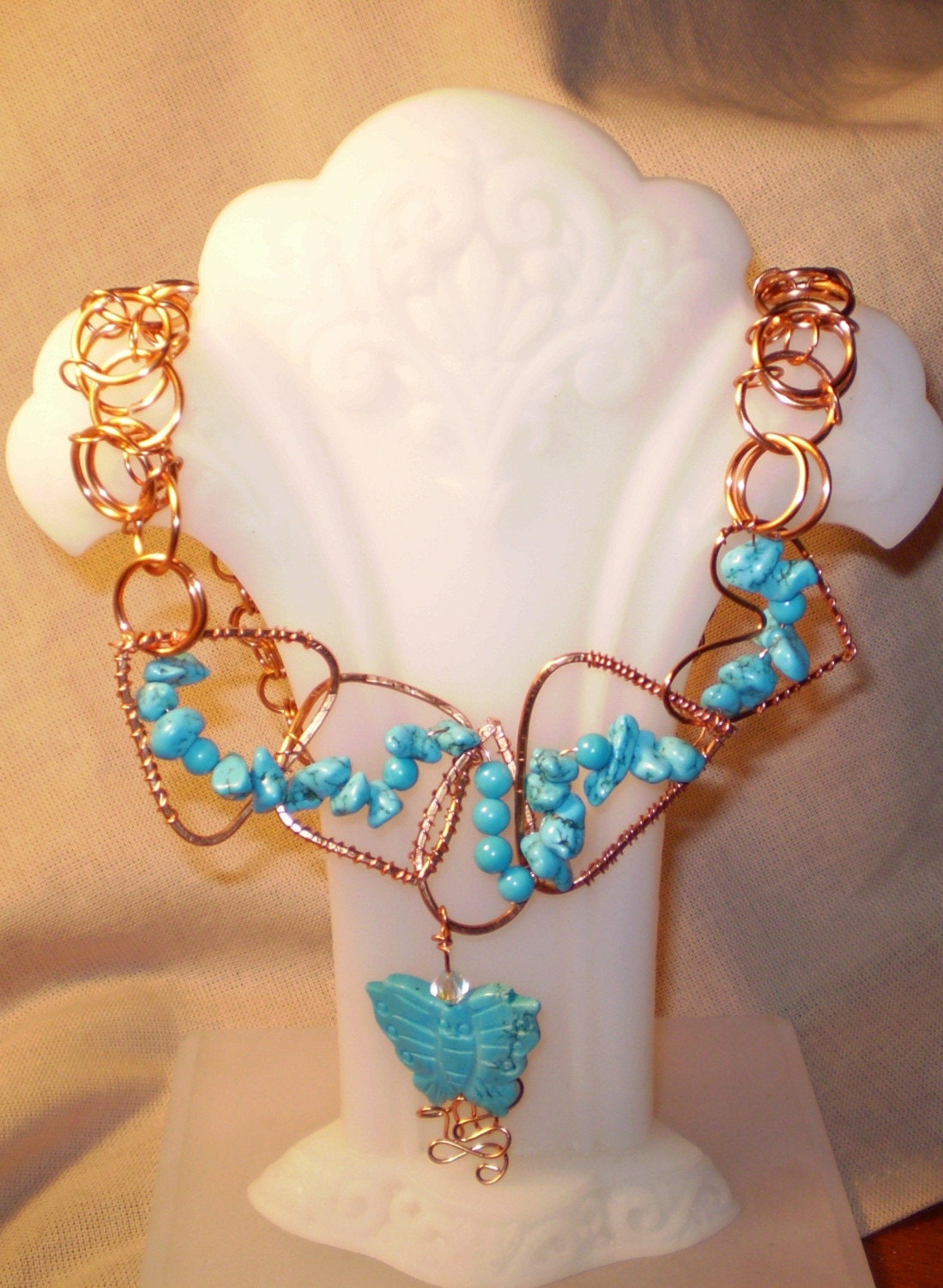Turquoise and hammered copper necklace with carved turquoise butterfly