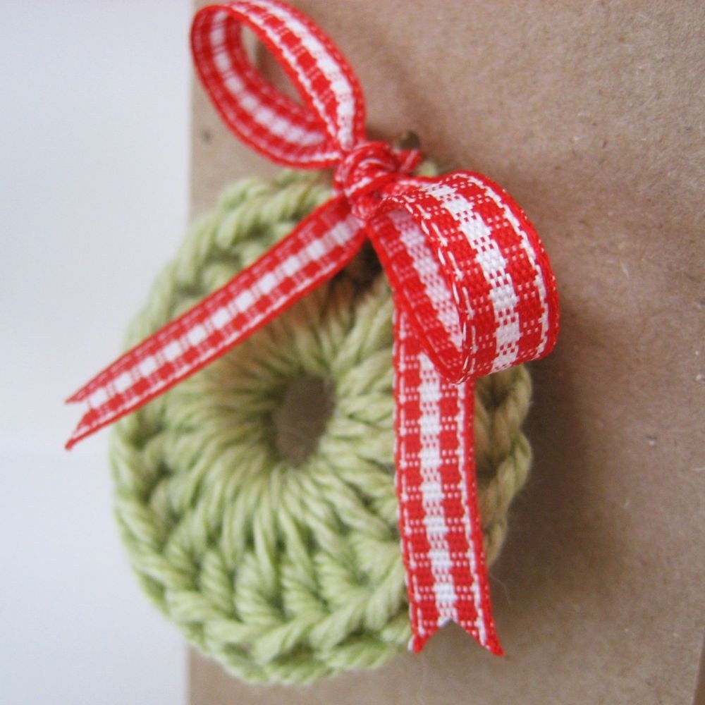reserved handmade gift enclosure card kraft with wreath and red gingham ribbon bow