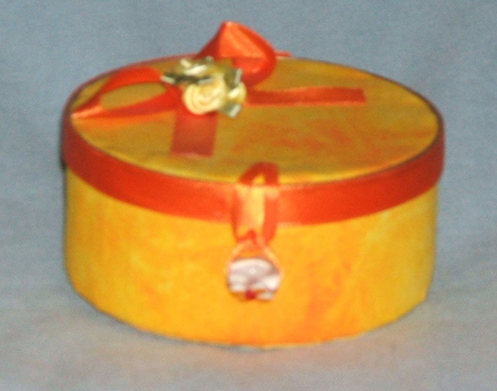 Upcycled can--yellow and orange
