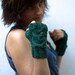 Green fingerless gloves , mittens with an owl pattern