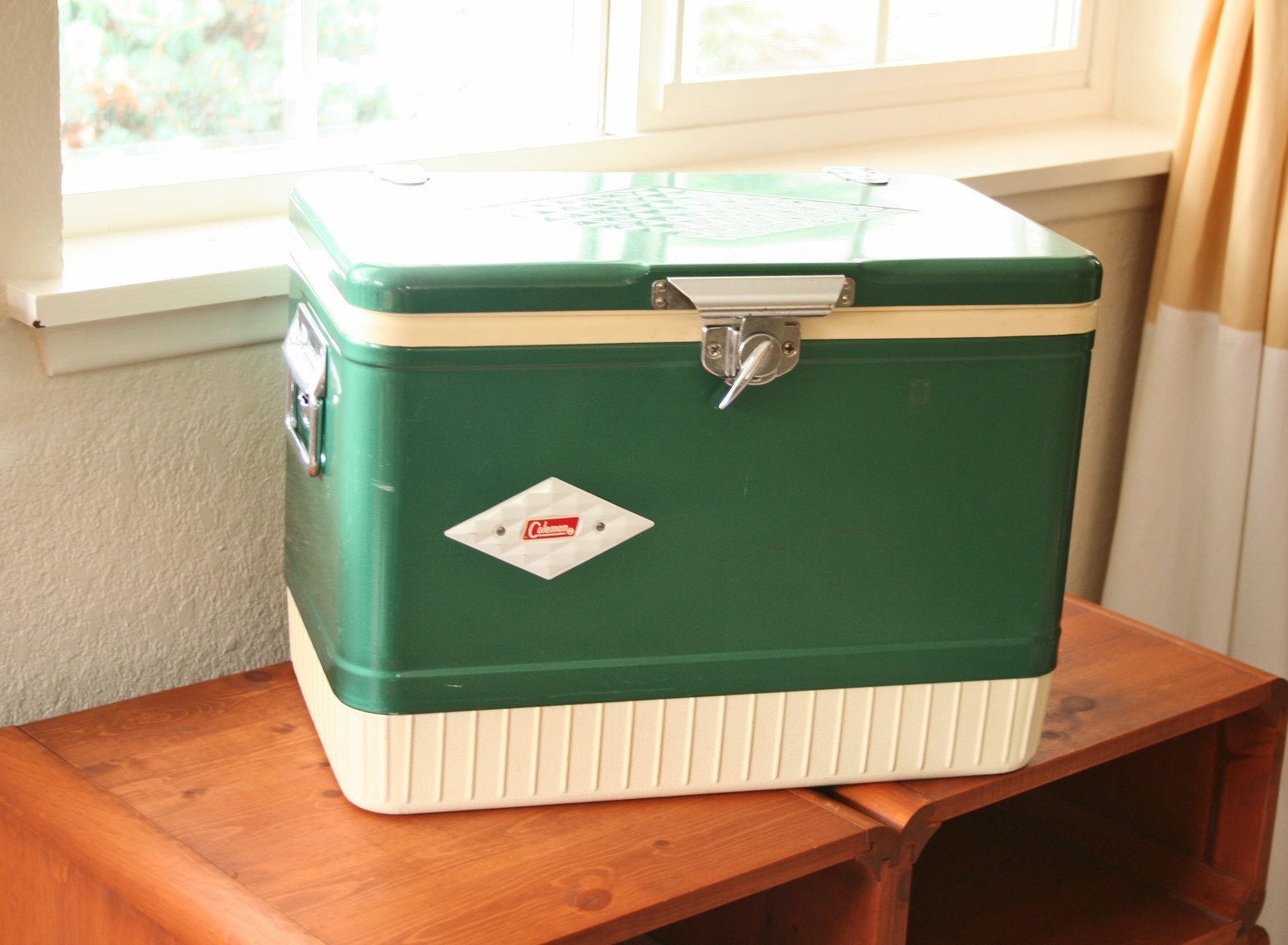 vintage green metal Coleman cooler with diamond by