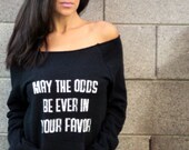 May the Odds Be Ever in Your Favor.  Off the Shoulder Girly Sweatshirt Size LARGE