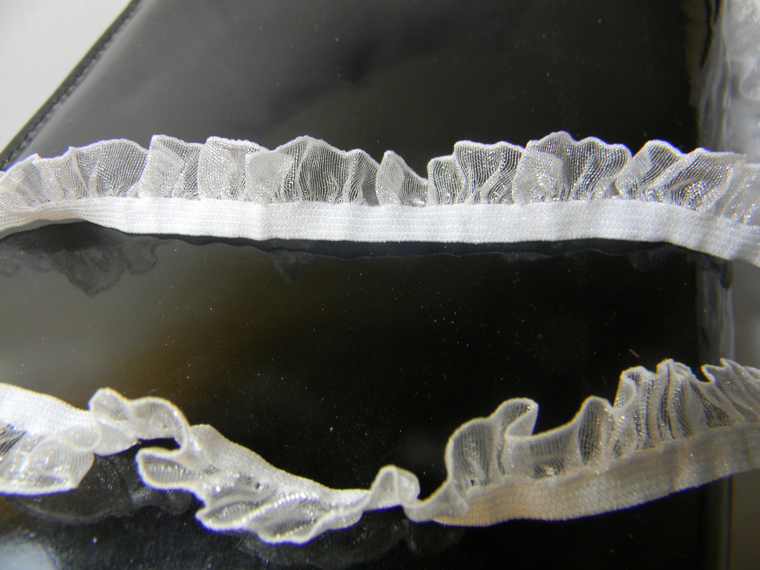 White elasticated trim with a ruffled edge - 2 yards - for lingerie, babies clothes and more