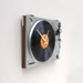 Clock made from a recycled Sanyo turntable