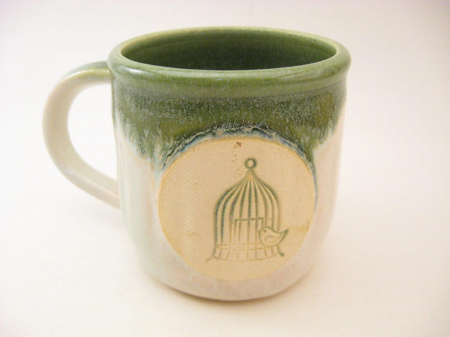 Coffee Mug Green and White with Bird in Cage Stamp