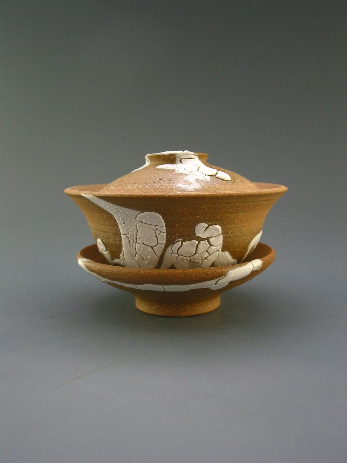 Gaiwan, iron-rich stoneware with unglazed interior and crawling glaze accents