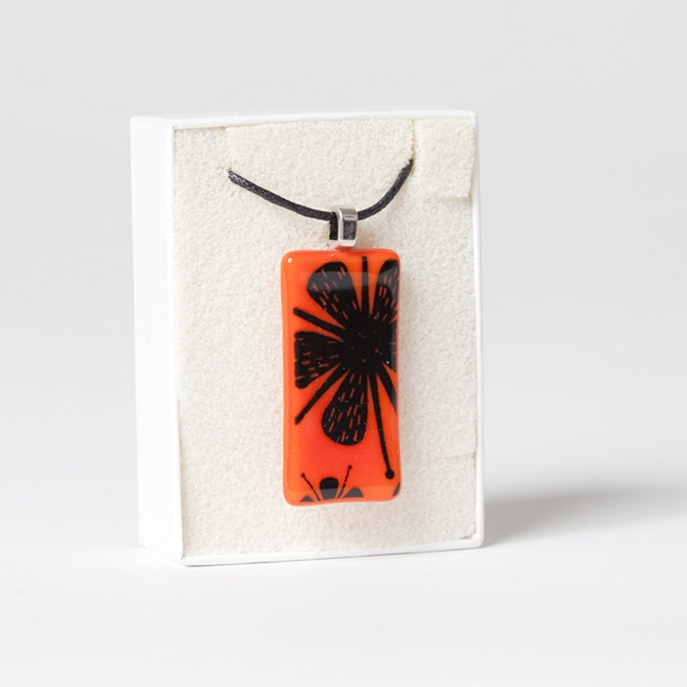 Orange Flowers Glass Pendant Black Enamel on Cotton